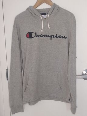 Champion Light Gray Pullover Hoodie with Script Logo and Red Accent